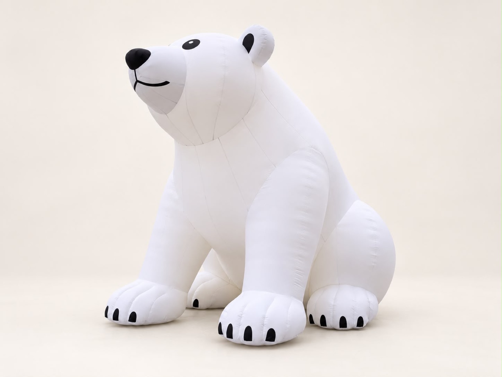 Ours polaire assis gonflable lumineux, vue de trois-quarts